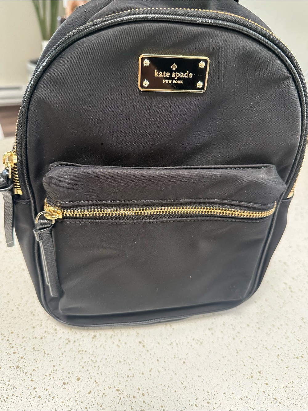 NWOT Kate Spade black nylon mini backpack with gold